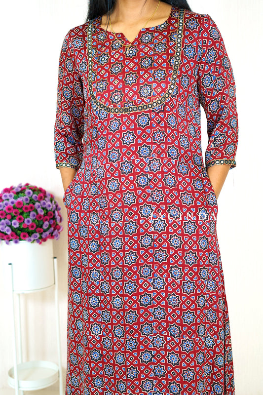 Jacinda Modal Silk A-line kurti for modern women with red and blue geometric patterns and three-quarter sleeves