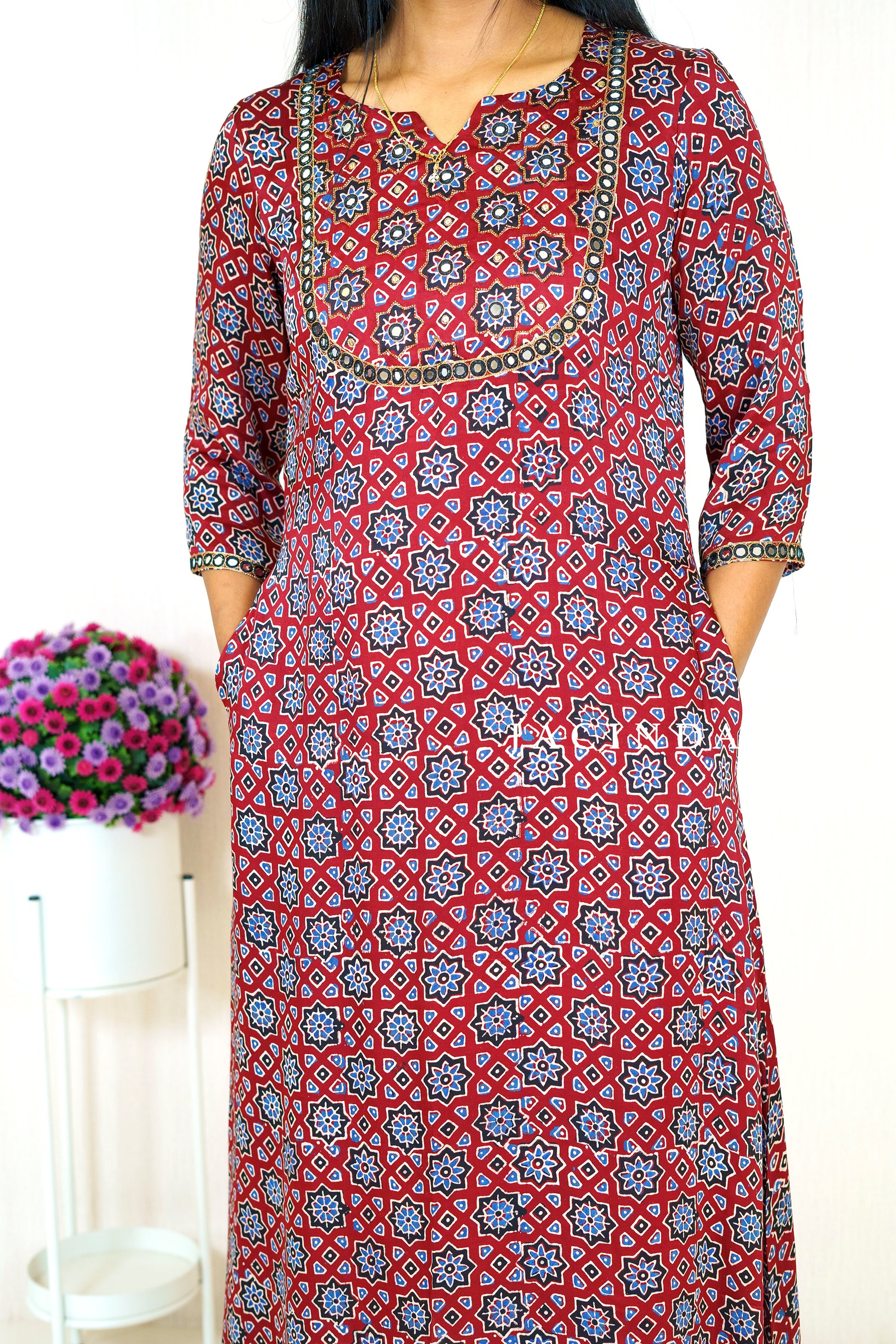 Jacinda Modal Silk A-line kurti for modern women with red and blue geometric patterns and three-quarter sleeves