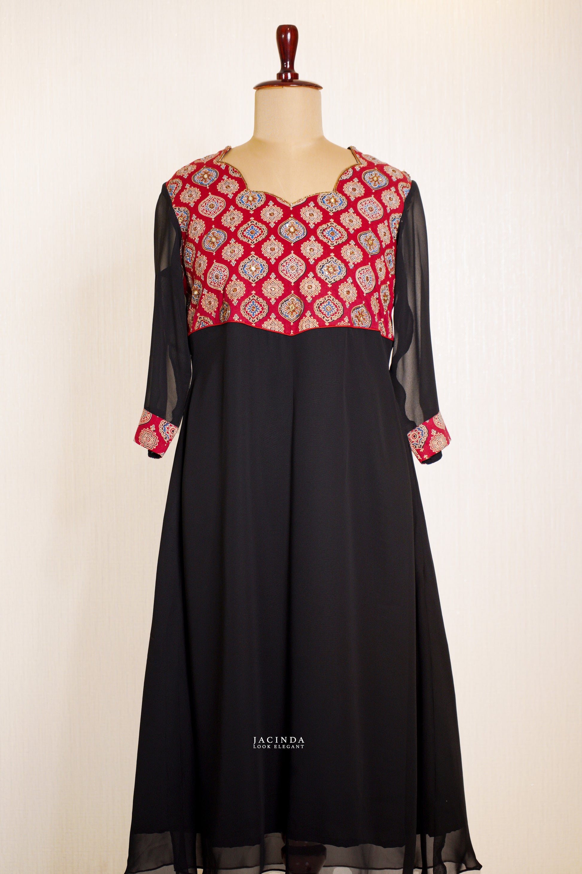 Ajrak Handcrafted Embroidery Dress for Women with a vibrant red embroidered bodice and flowing black skirt