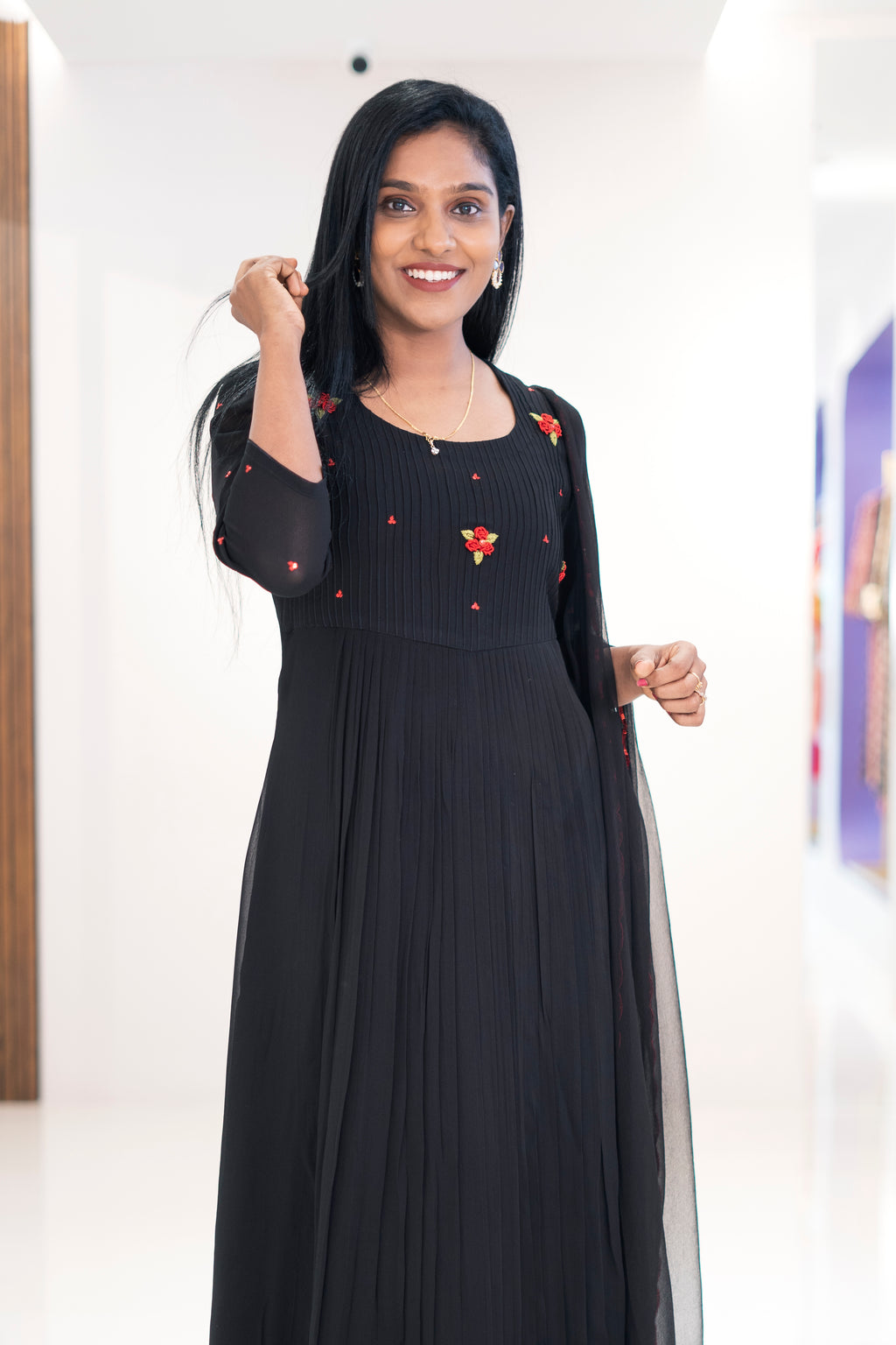 Jacinda black georgette embroidered dress with floral designs and pleated detail for elegant occasions