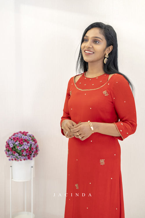 Elegant red chinnon dress for women with intricate embellishments, perfect for special occasions