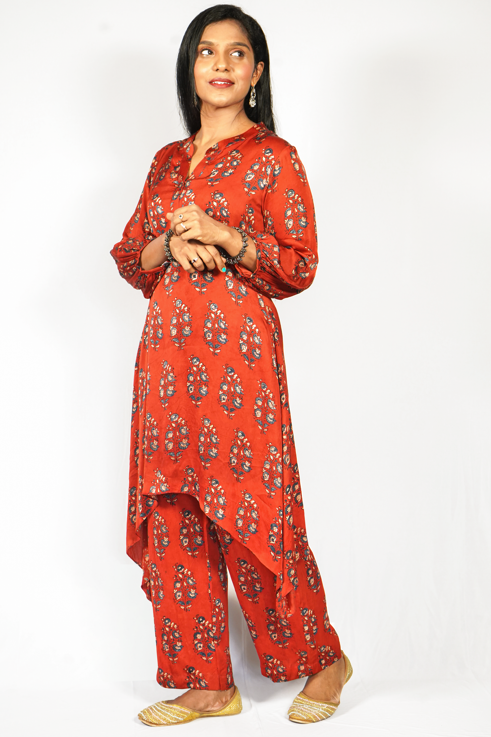 Stylish Jacinda modal silk ethnic set for women in vibrant orange floral design with elegant silhouette