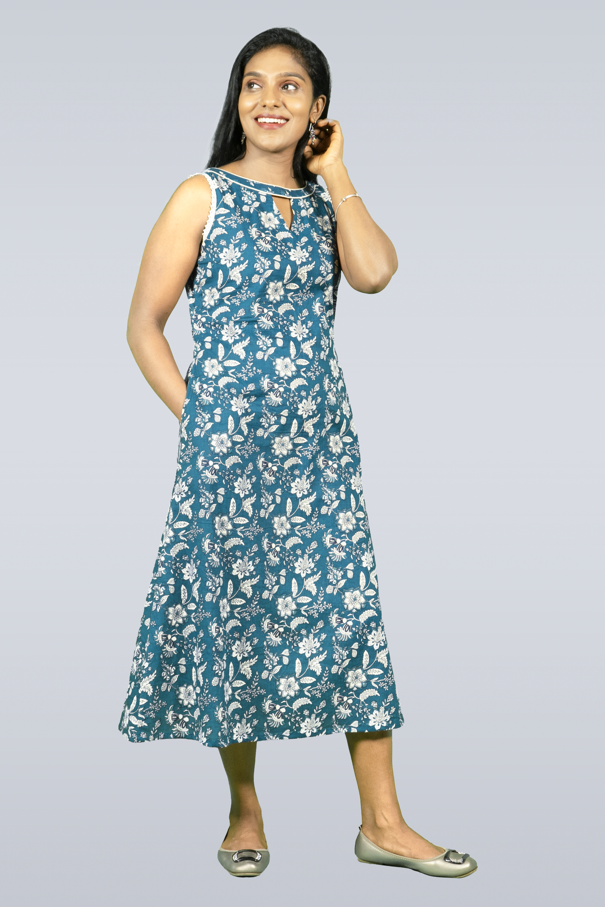 Jacinda sleeveless A-line dress for women in blue with white floral print and midi length