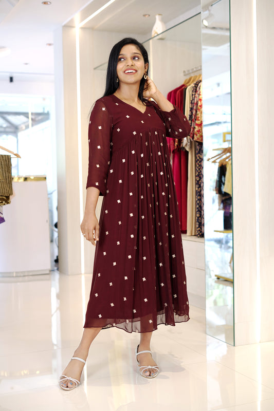 Jacinda stylish maroon party dress online with white print, three-quarter sleeves and flowy design